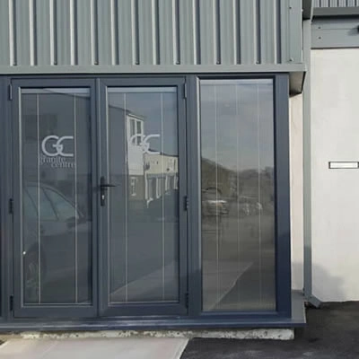 Frosted Window Graphics on Entrance Doors showing Granite Center and GC logo